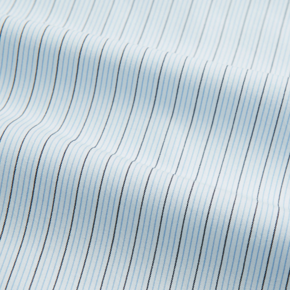 The Turnbull & Asser Blue Multi Pinstripe Mayfair Shirt is a long-sleeve, organic cotton dress shirt with button front, classic collar, and cuffs, shown on a white background.