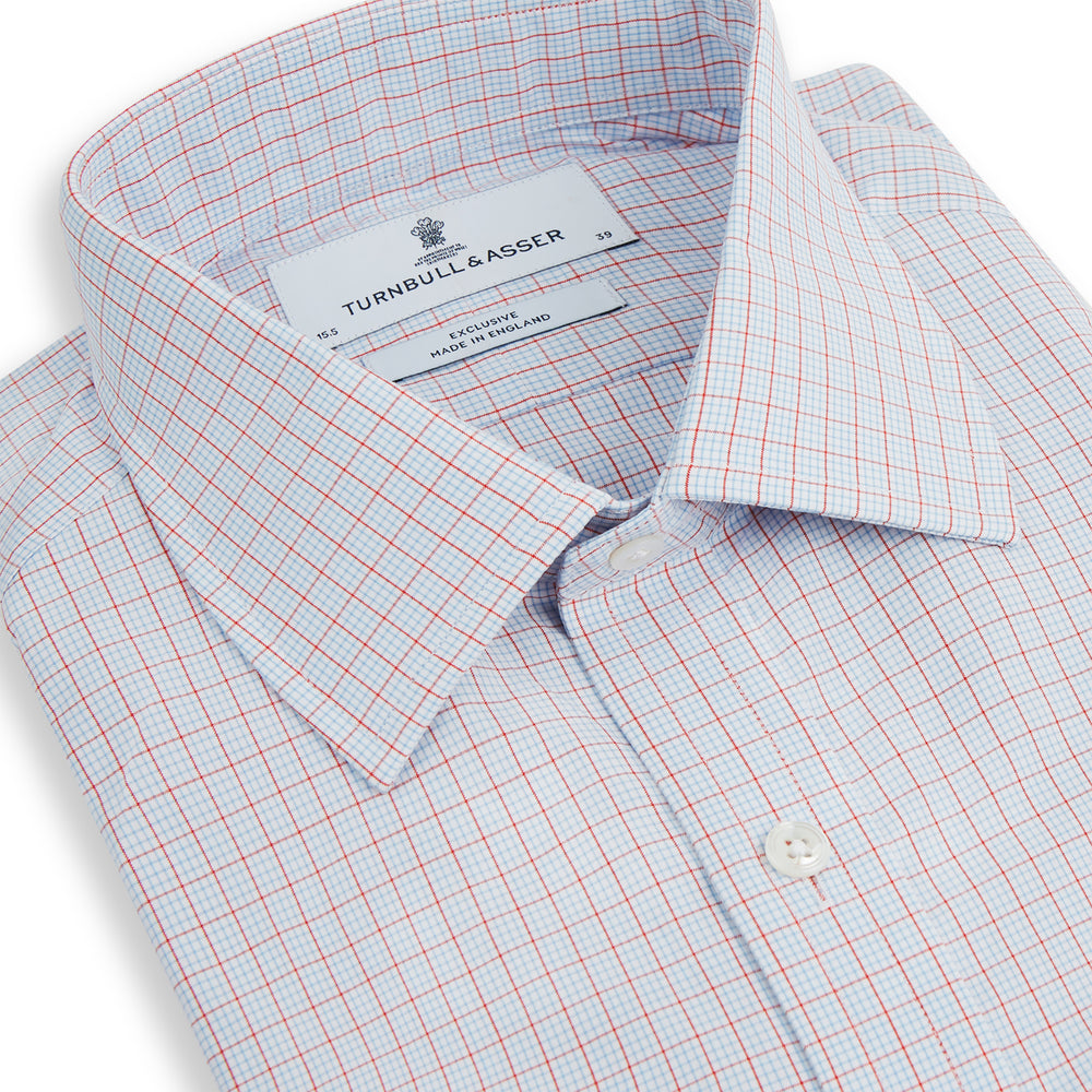 Red multi graph check long-sleeve Mayfair shirt by Turnbull & Asser, featuring a pointed collar and buttoned cuffs, crafted from breathable cotton and laid flat against a white background.
