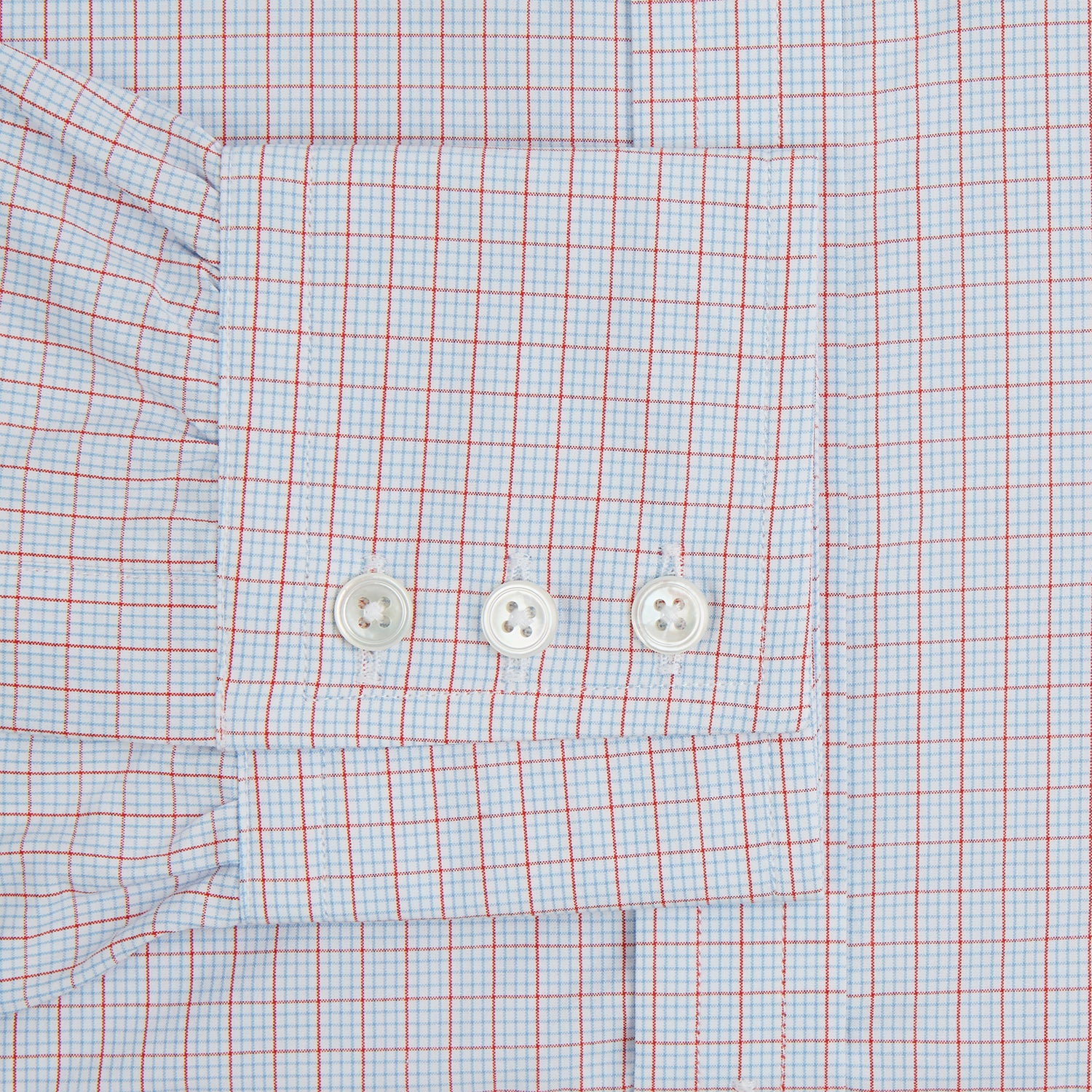 View 3 of product Red multi graph check long-sleeve Mayfair shirt by Turnbull & Asser, featuring a pointed collar and buttoned cuffs, crafted from breathable cotton and laid flat against a white background.