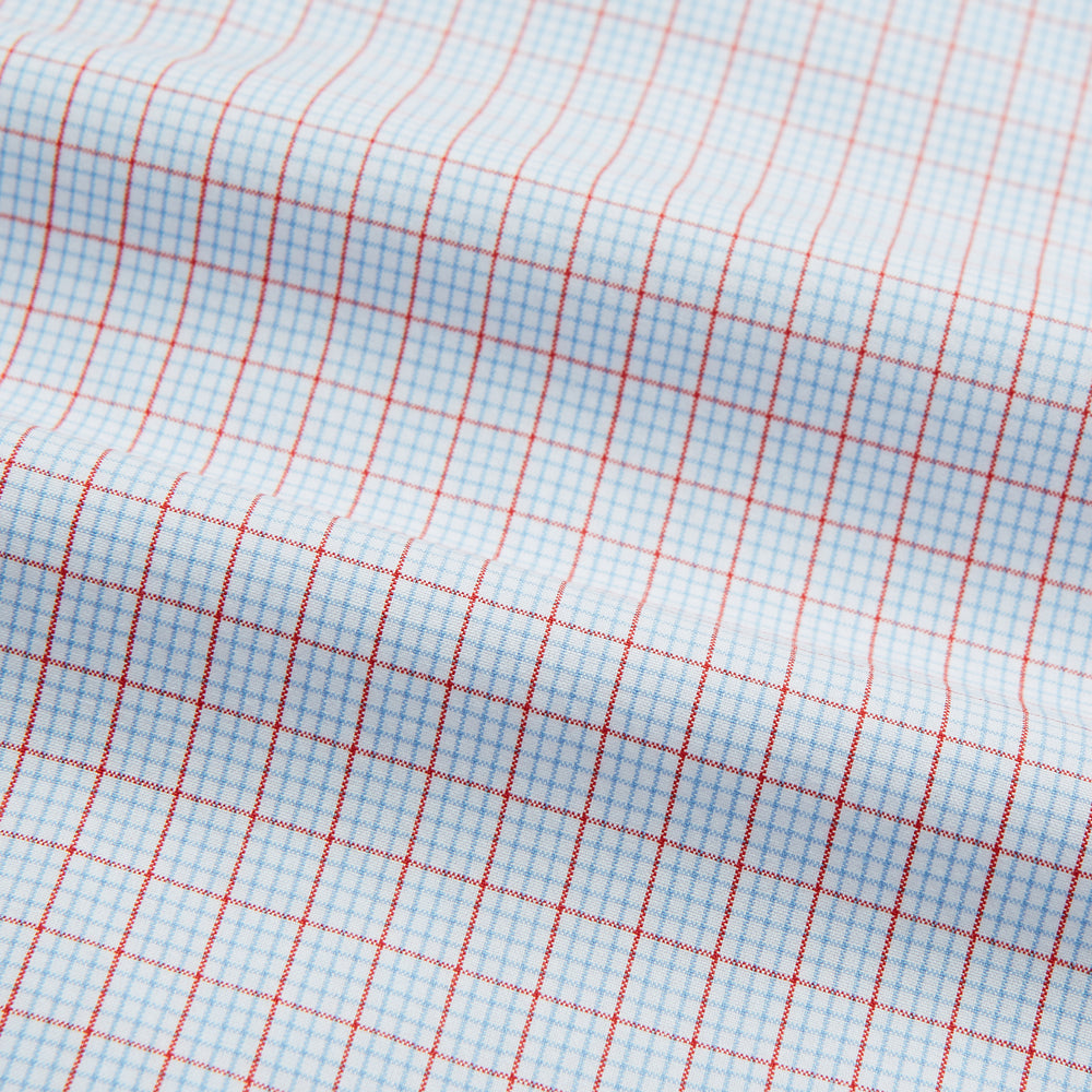 Red multi graph check long-sleeve Mayfair shirt by Turnbull & Asser, featuring a pointed collar and buttoned cuffs, crafted from breathable cotton and laid flat against a white background.