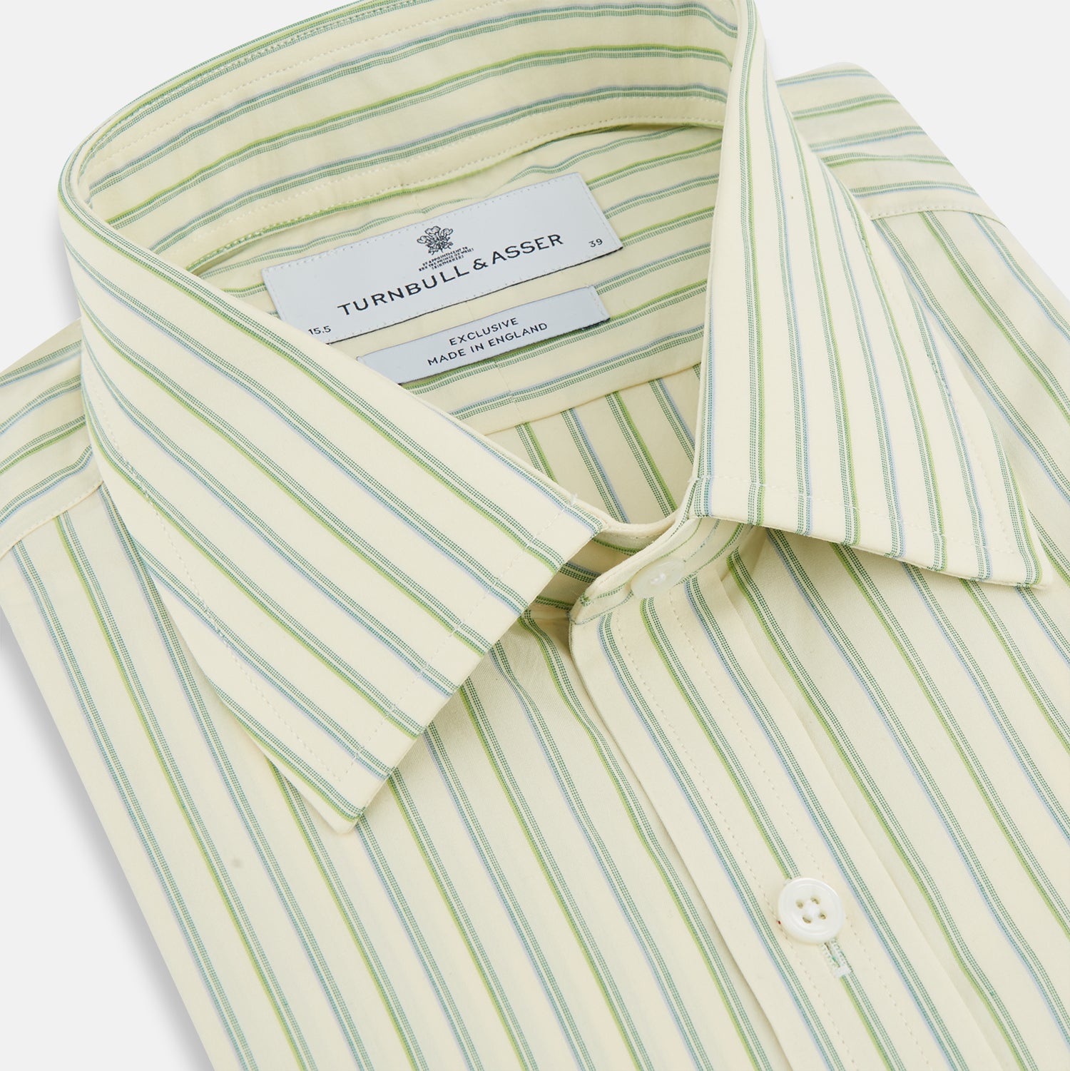 View 2 of product The Green Double Stripe Mayfair Shirt by Turnbull & Asser features light green and white vertical stripes, long sleeves, a T&A collar, and buttoned cuffs. Made from organic cotton and shown laid flat on a white background.