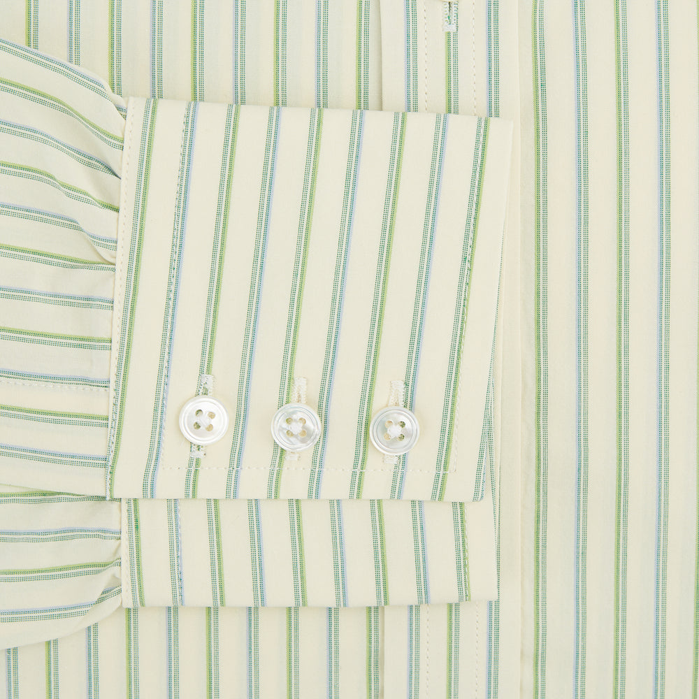 The Green Double Stripe Mayfair Shirt by Turnbull & Asser features light green and white vertical stripes, long sleeves, a T&A collar, and buttoned cuffs. Made from organic cotton and shown laid flat on a white background.