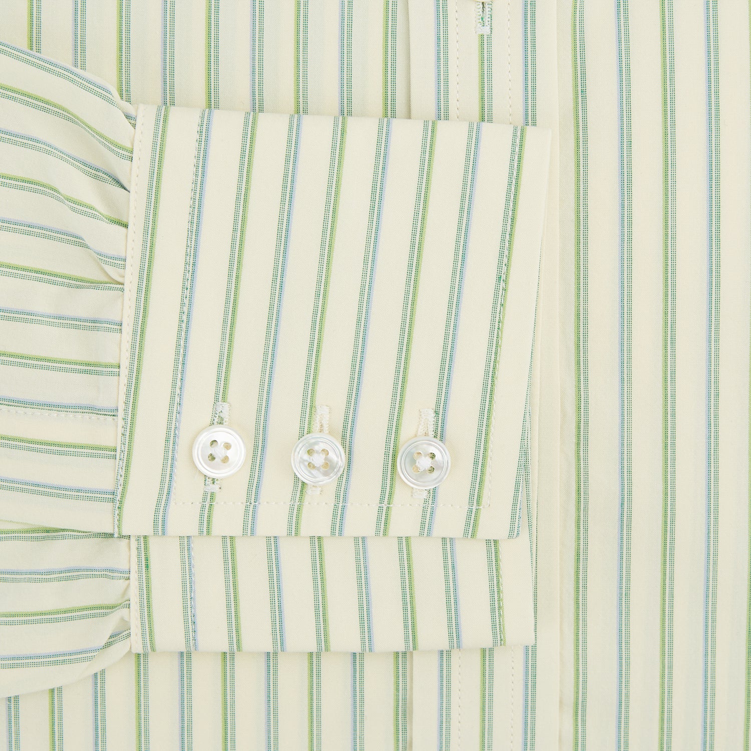 View 3 of product The Green Double Stripe Mayfair Shirt by Turnbull & Asser features light green and white vertical stripes, long sleeves, a T&A collar, and buttoned cuffs. Made from organic cotton and shown laid flat on a white background.