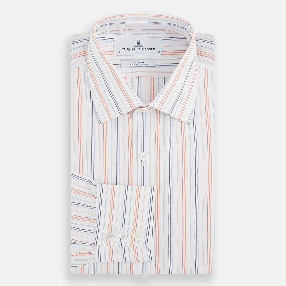 The Turnbull & Asser Orange and Blue Multi Stripe Mayfair Shirt is a long-sleeved, collared button-up made from organic cotton and features vibrant vertical stripes—an ideal summer staple.