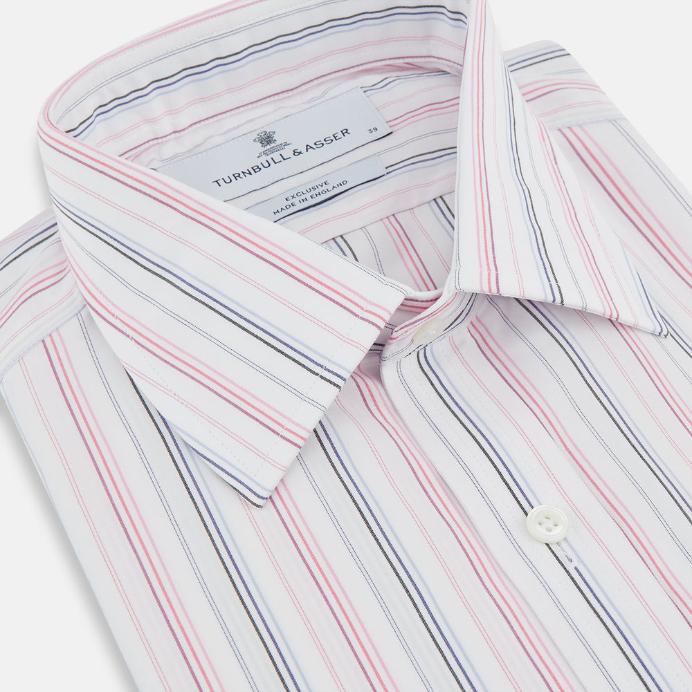 The Pink and Blue Multi Stripe Mayfair Shirt by Turnbull & Asser features vertical pastel stripes, a T&A collar, and buttoned cuffs. Made from organic cotton, the long-sleeve shirt is shown on a plain white background.