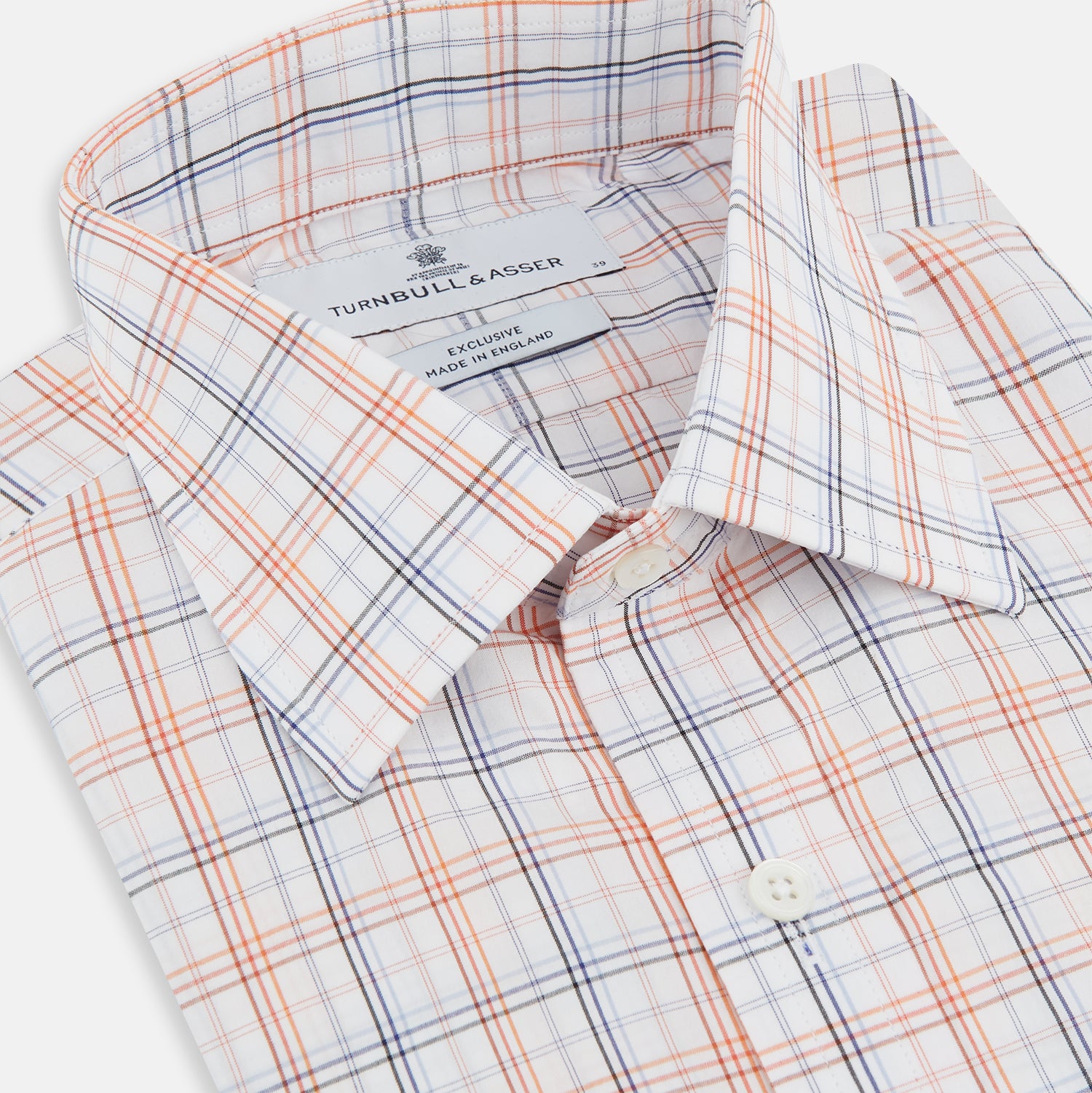 View 2 of product The Orange and Blue Multi Check Mayfair Shirt by Turnbull & Asser is an organic cotton summer staple, featuring long sleeves and a light blue, orange, and white plaid pattern.
