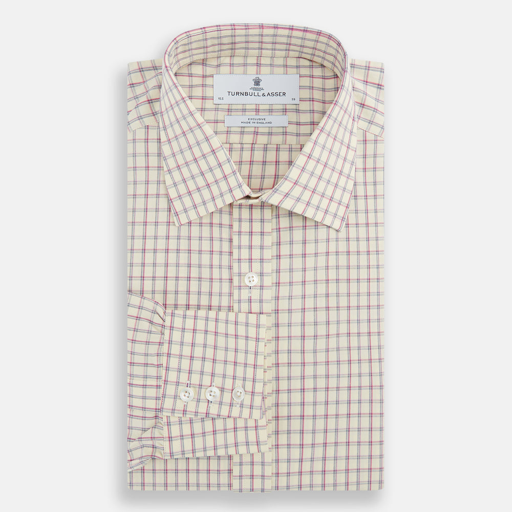 The Turnbull & Asser Pink Multi Check Mayfair Shirt features a T&A collar, long sleeves, and a pink check pattern on white organic cotton, shown against a plain white background.