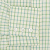 View 3 of product The Turnbull & Asser Green Multi Check Mayfair Shirt features a light green and white checkered pattern, long sleeves, a collar, and buttoned cuffs. Displayed on a white background.