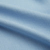 View 6 of product The Blue Cotton Cashmere Chelsea Shirt by Turnbull & Asser, a light blue long-sleeve button-up with a chest pocket, crafted from soft cotton and cashmere, is shown laid flat on a white background.