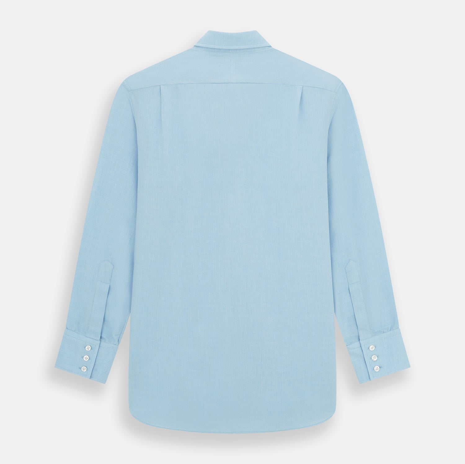 View 5 of product The Blue Cotton Cashmere Chelsea Shirt by Turnbull & Asser, a light blue long-sleeve button-up with a chest pocket, crafted from soft cotton and cashmere, is shown laid flat on a white background.