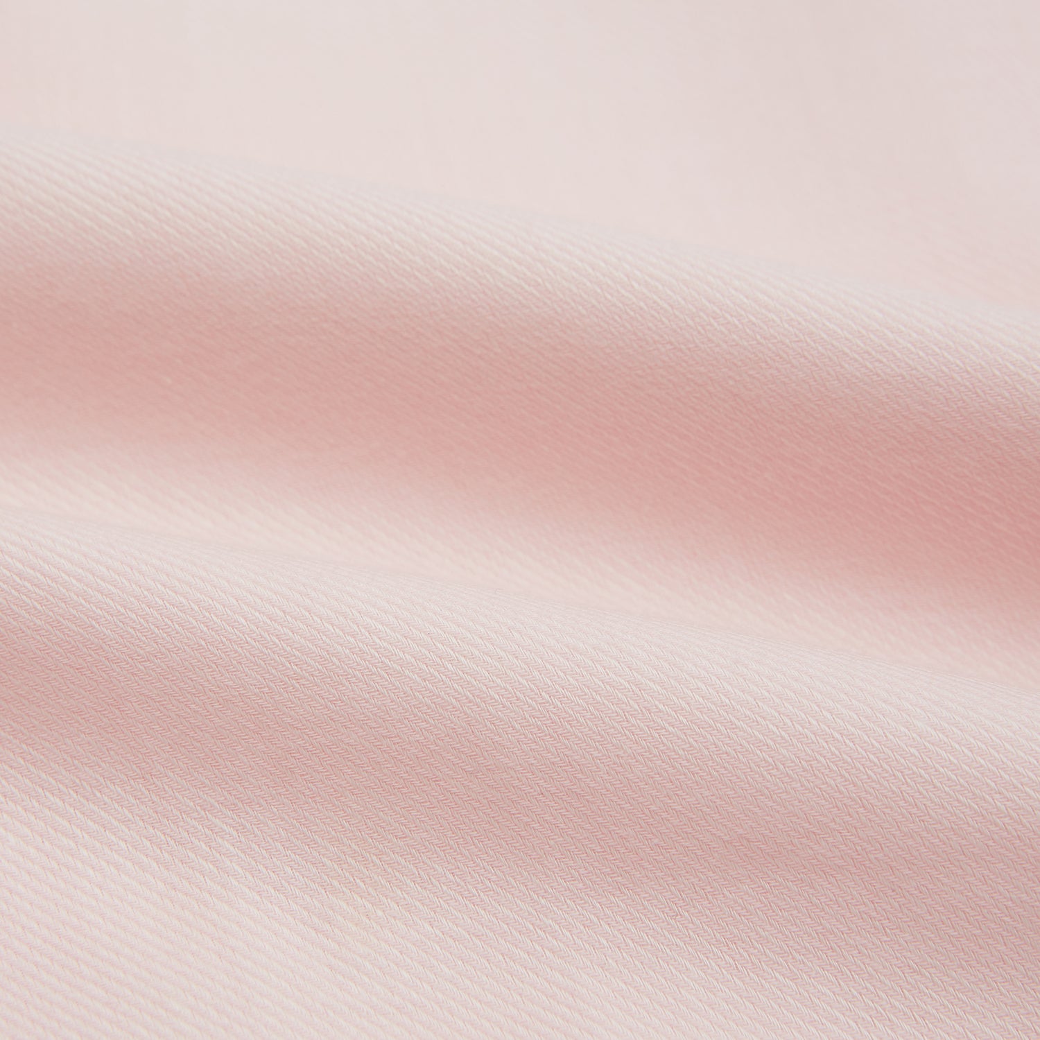 View 6 of product The Turnbull & Asser Pale Pink Cotton Cashmere Chelsea Shirt features long sleeves, a chest pocket, spread collar, and buttoned cuffs. Crafted from a luxurious cotton-cashmere blend, it's shown laid flat on a white background.