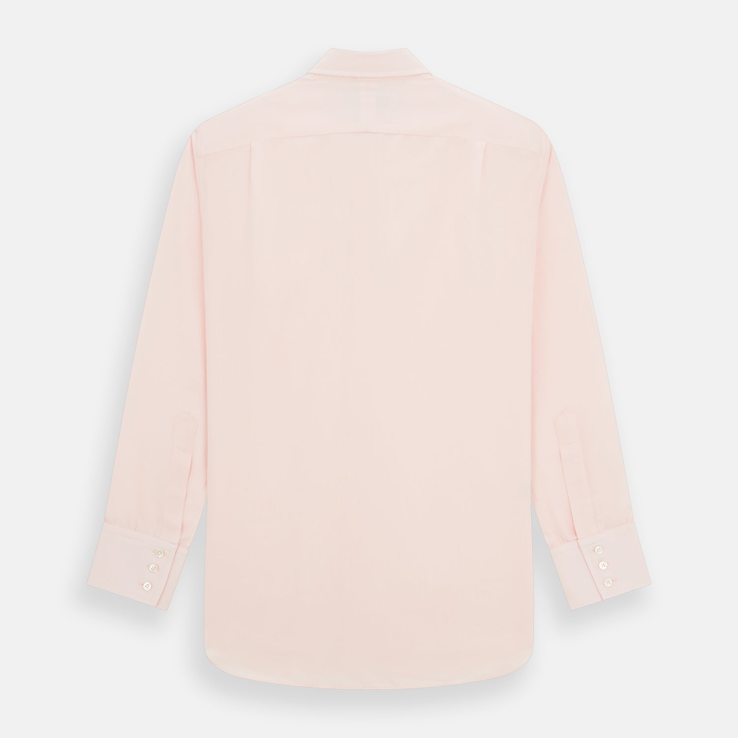 View 5 of product The Turnbull & Asser Pale Pink Cotton Cashmere Chelsea Shirt features long sleeves, a chest pocket, spread collar, and buttoned cuffs. Crafted from a luxurious cotton-cashmere blend, it's shown laid flat on a white background.