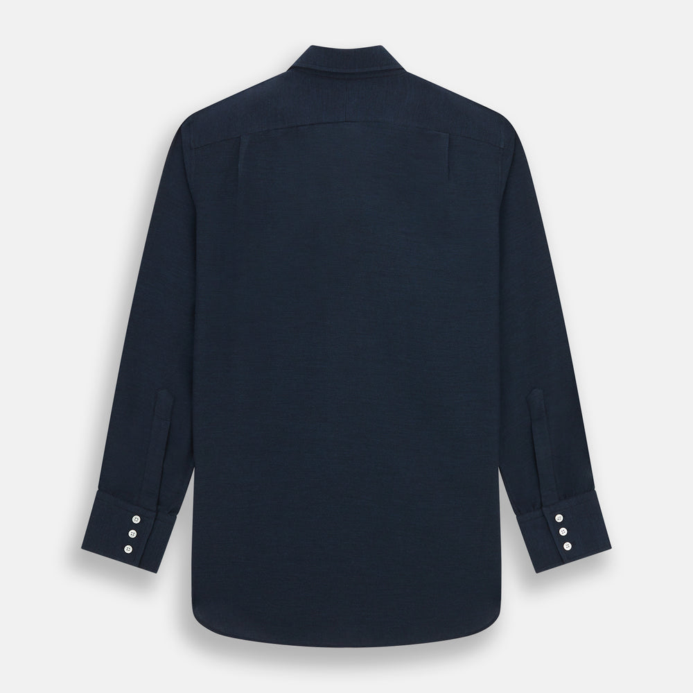 The Turnbull & Asser Navy Cotton Cashmere Chelsea Shirt features long sleeves, a classic collar, front chest pocket, and white buttons, shown laid flat on a white background.