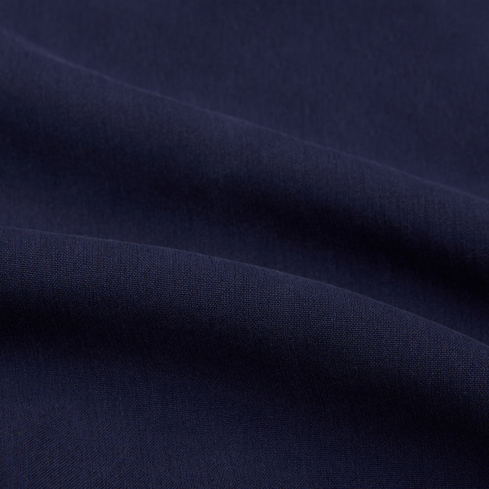 The Navy Silk Chelsea Shirt by Turnbull & Asser features a long sleeve, collar, single chest pocket, and a refined Chelsea fit, displayed against a white background.