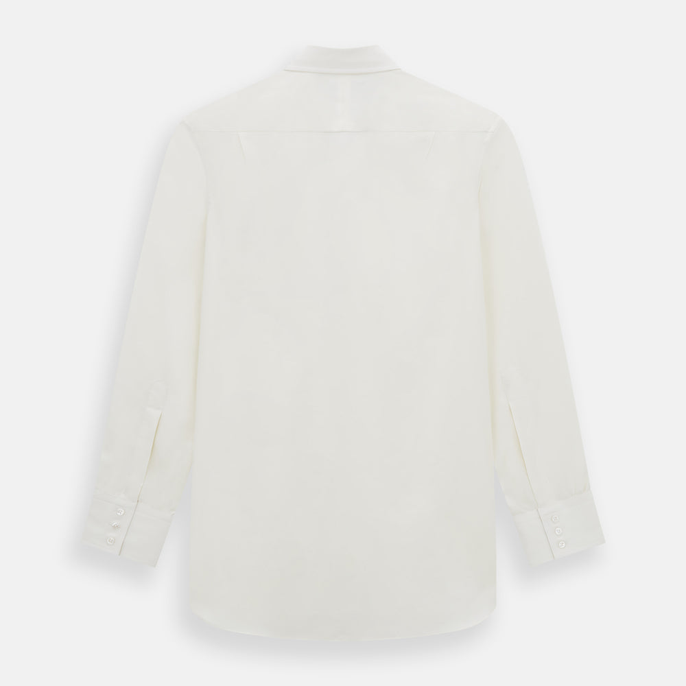 The Turnbull & Asser Cream Silk Chelsea Shirt is an elegant white long-sleeve, button-up silk shirt with a single chest pocket, shown against a plain white background.