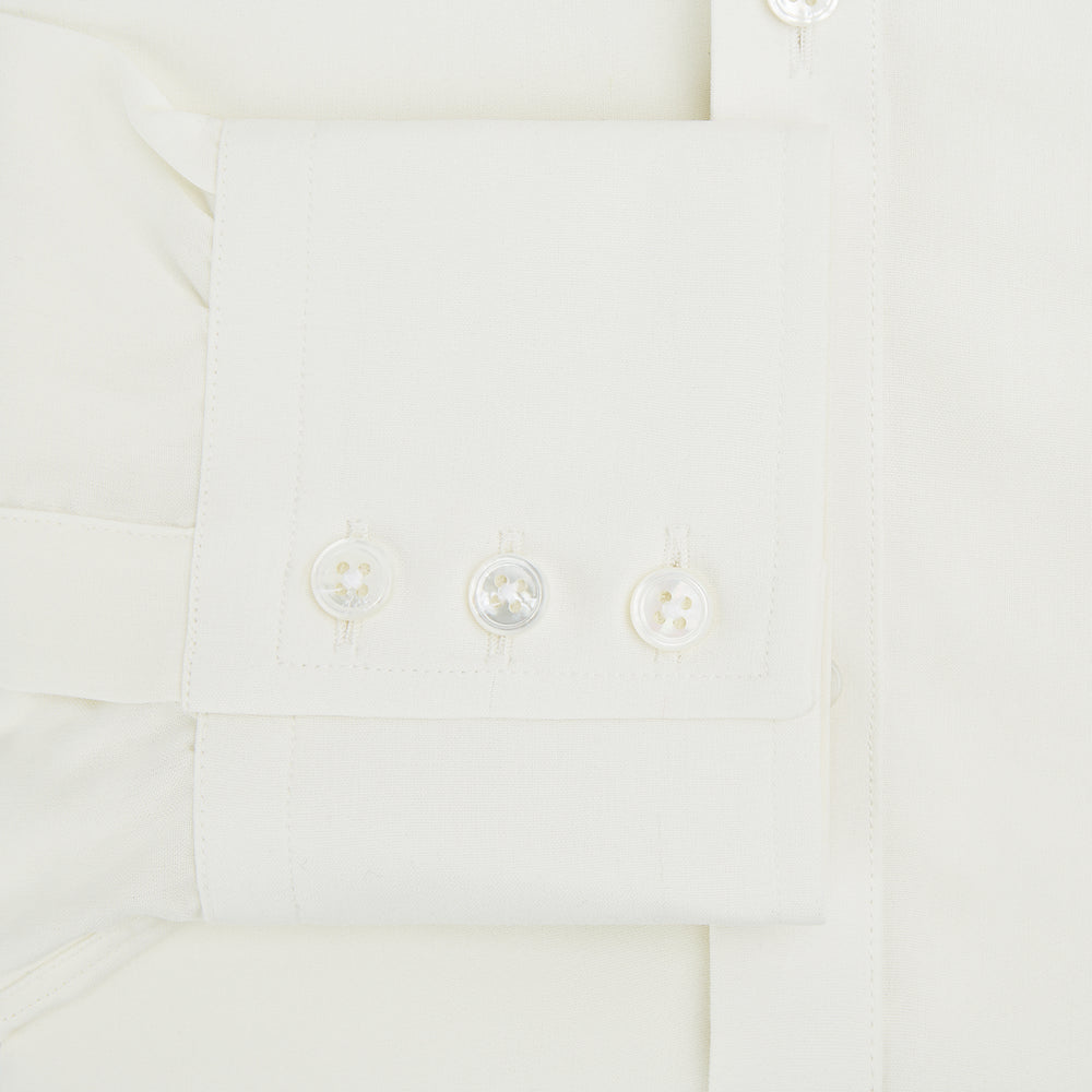 The Turnbull & Asser Cream Silk Chelsea Shirt is an elegant white long-sleeve, button-up silk shirt with a single chest pocket, shown against a plain white background.