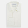 View 5 of product The Turnbull & Asser Cream Silk Chelsea Shirt is an elegant white long-sleeve, button-up silk shirt with a single chest pocket, shown against a plain white background.