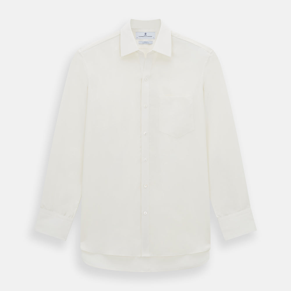The Turnbull & Asser Cream Silk Chelsea Shirt is an elegant white long-sleeve, button-up silk shirt with a single chest pocket, shown against a plain white background.