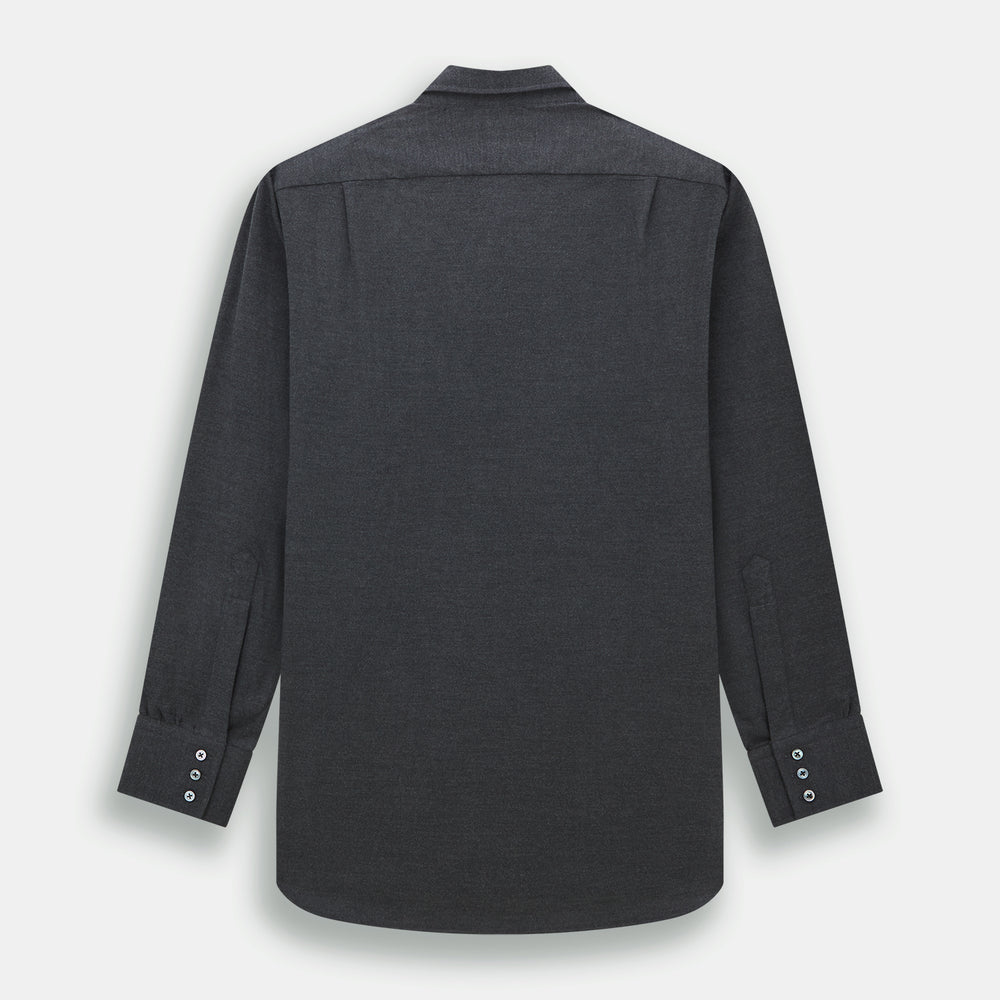 The Charcoal Chelsea Shirt by Turnbull & Asser is a long-sleeve, collared shirt in charcoal gray with a single chest pocket, offering smart-casual style, shown on a plain white background.