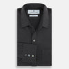 View 4 of product The Charcoal Chelsea Shirt by Turnbull & Asser is a long-sleeve, collared shirt in charcoal gray with a single chest pocket, offering smart-casual style, shown on a plain white background.