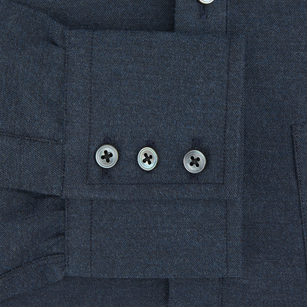 The Navy Chelsea Shirt by Turnbull & Asser is a long-sleeve, button-down flannel with a chest pocket, shown flat on a white background for a classic smart-casual style.