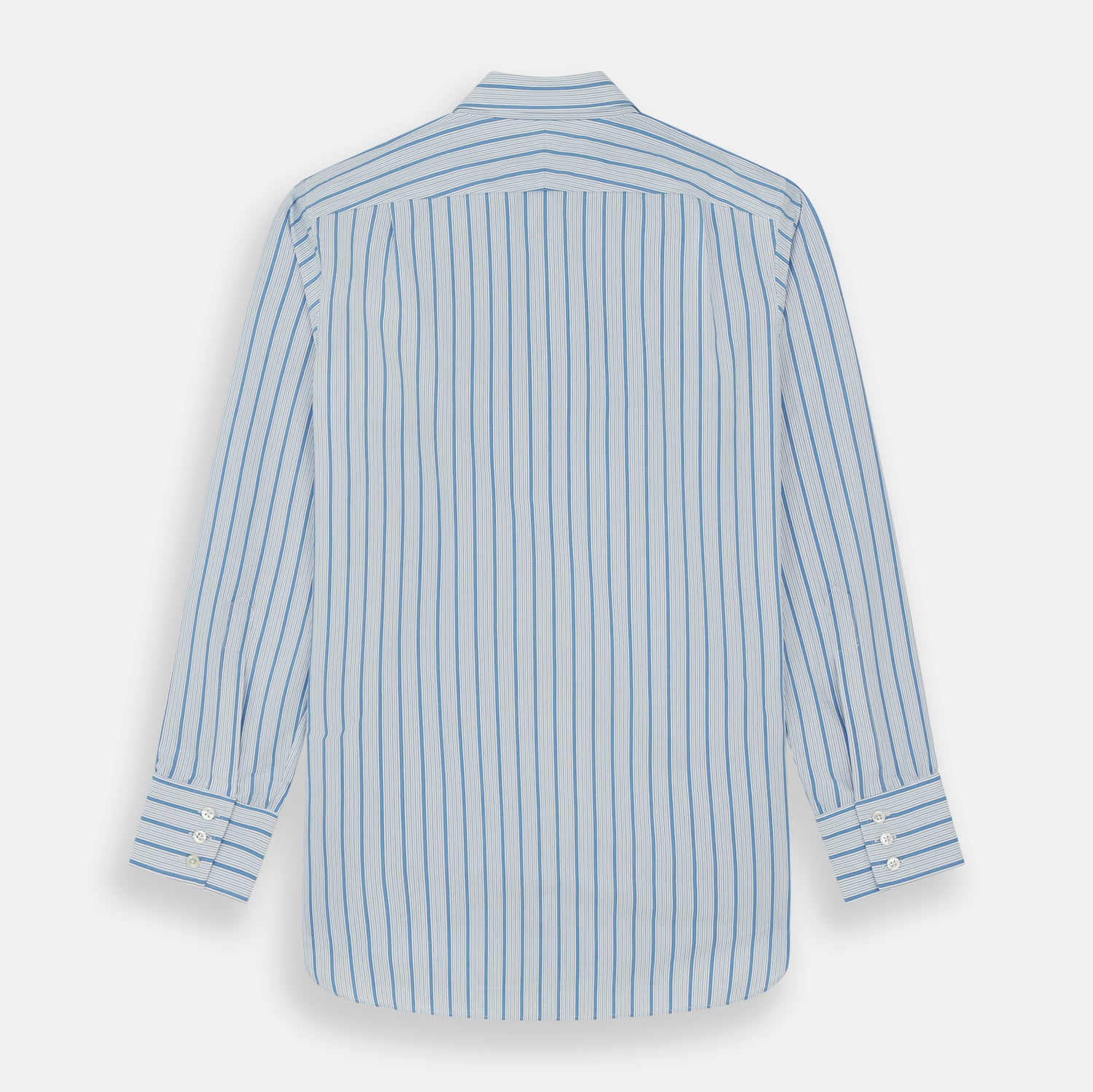 View 6 of product The Turnbull & Asser Blue Multi Track Stripe Chelsea Shirt features long sleeves, a light blue multi-stripe design, a chest pocket, open collar, and buttoned cuffs, shown laid flat on a white background.