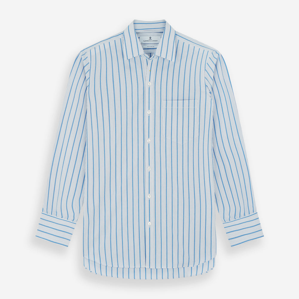The Turnbull & Asser Blue Multi Track Stripe Chelsea Shirt features long sleeves, a light blue multi-stripe design, a chest pocket, open collar, and buttoned cuffs, shown laid flat on a white background.