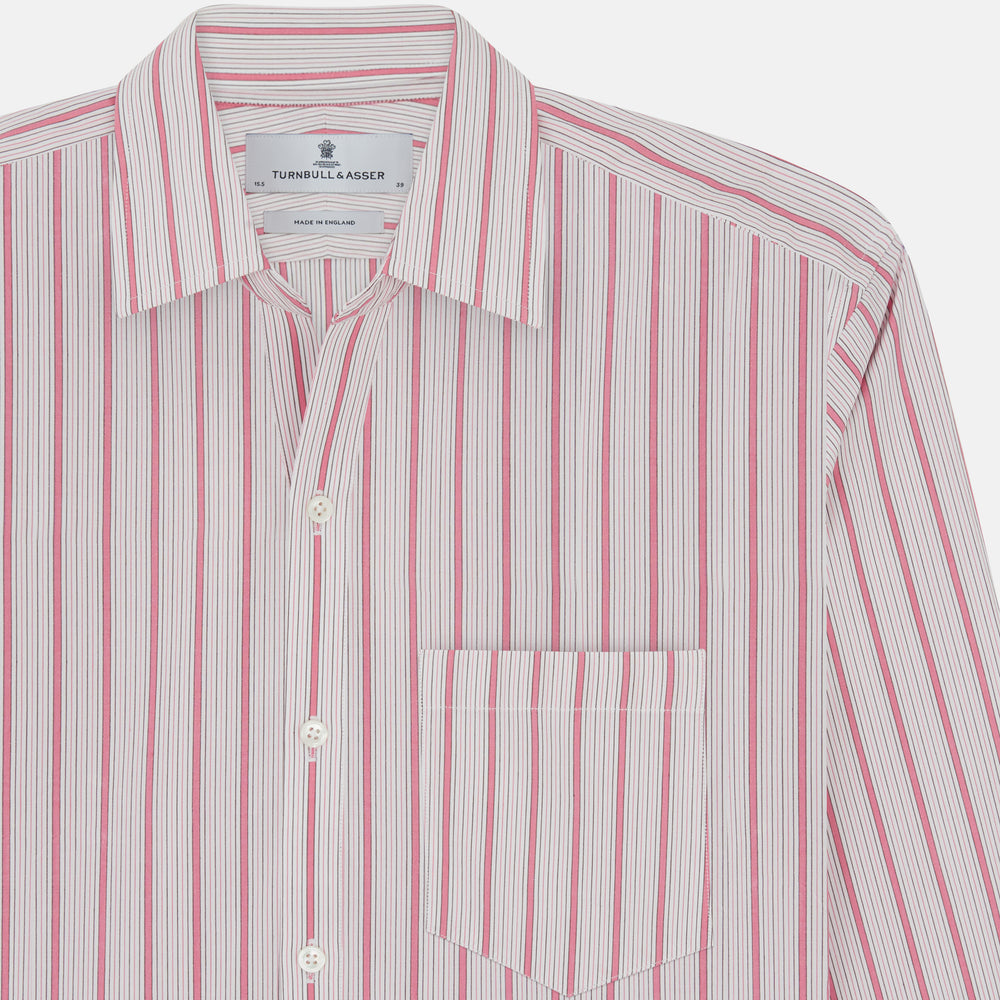 The Turnbull & Asser Pink Multi Track Stripe Chelsea Shirt features long sleeves, an open T&A collar, a left chest pocket, and buttoned cuffs, shown laid flat on a white background.