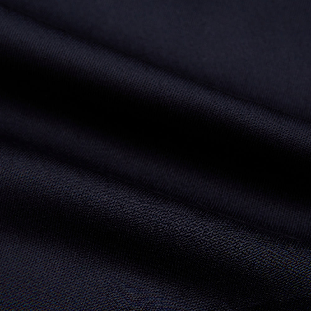 The Turnbull & Asser Navy Twill Chelsea Shirt is a long-sleeve button-up with a collar, front chest pocket, and white buttons, shown against a plain white background.