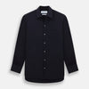 View 1 of product The Turnbull & Asser Navy Twill Chelsea Shirt is a long-sleeve button-up with a collar, front chest pocket, and white buttons, shown against a plain white background.