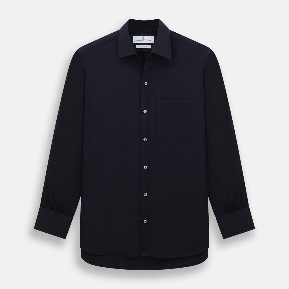 The Turnbull & Asser Navy Twill Chelsea Shirt is a long-sleeve button-up with a collar, front chest pocket, and white buttons, shown against a plain white background.