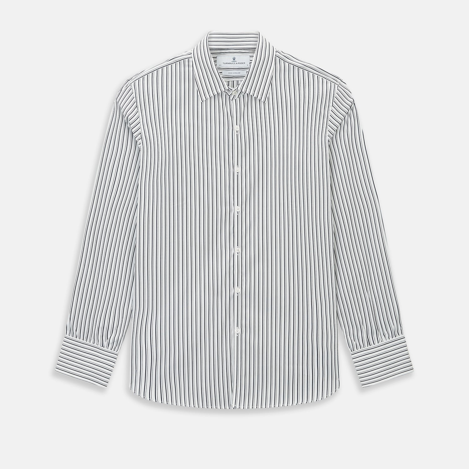 View 1 of product Laid flat on a white background, the Turnbull & Asser UK Westminster White Regular Fit Shirt in Cotton features vertical black and white stripes, a classic collar, buttoned cuffs, and a button-up front—an elegant wardrobe essential that offers timeless style for everyday wear.