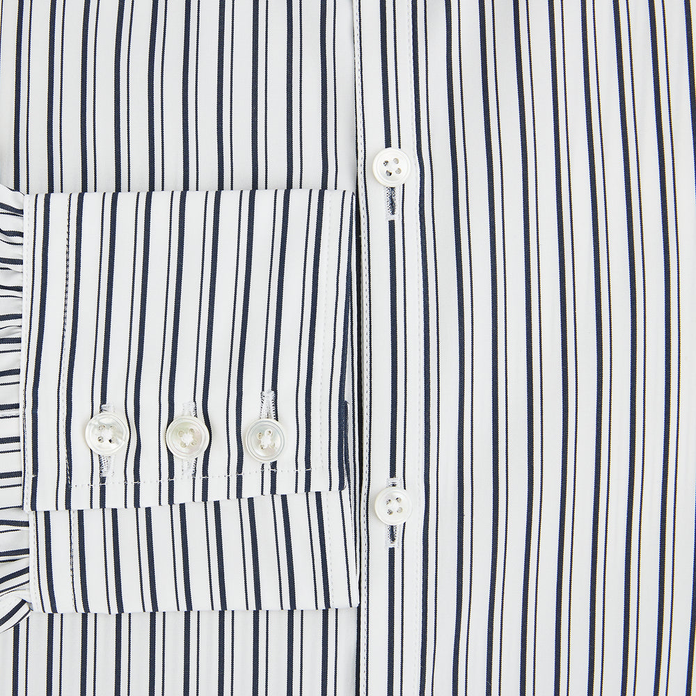Laid flat on a white background, the Turnbull & Asser UK Westminster White Regular Fit Shirt in Cotton features vertical black and white stripes, a classic collar, buttoned cuffs, and a button-up front—an elegant wardrobe essential that offers timeless style for everyday wear.