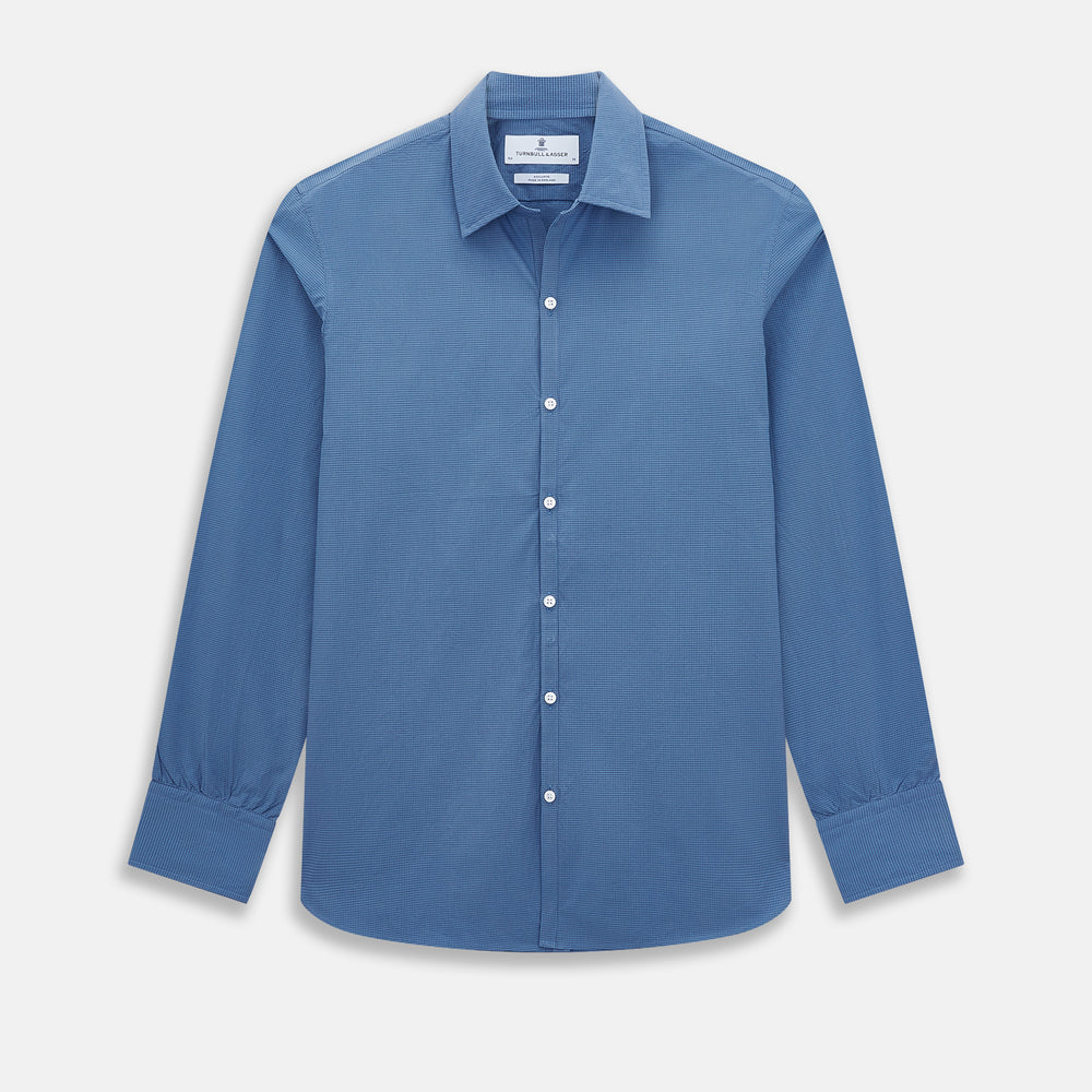 A Colony Blue Pin Check Windsor Shirt by Turnbull & Asser UK, featuring long sleeves, white buttons, a classic Turnbull collar, and buttoned cuffs—expertly crafted in Britain and displayed flat on a white background.