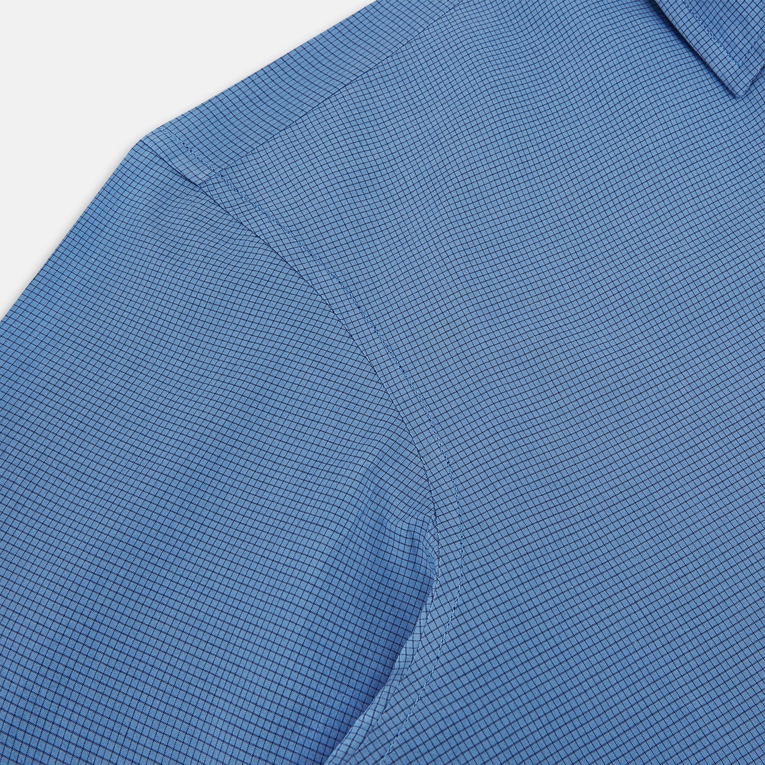 View 6 of product A Colony Blue Pin Check Windsor Shirt by Turnbull & Asser UK, featuring long sleeves, white buttons, a classic Turnbull collar, and buttoned cuffs—expertly crafted in Britain and displayed flat on a white background.