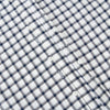 View 6 of product A Chequered Navy on White Windsor Regular Fit Shirt in Cotton by Turnbull & Asser UK, featuring long sleeves, a classic collar, buttoned cuffs, and a navy and white windowpane check pattern, displayed on a white background.