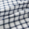 View 7 of product A Chequered Navy on White Windsor Regular Fit Shirt in Cotton by Turnbull & Asser UK, featuring long sleeves, a classic collar, buttoned cuffs, and a navy and white windowpane check pattern, displayed on a white background.