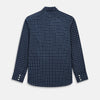 View 3 of product The Turnbull & Asser UK Windsor Navy Regular Fit Shirt in Cotton is a classic men's long-sleeve, button-up shirt featuring a navy blue base with a white grid pattern, displayed laid flat on a white background.
