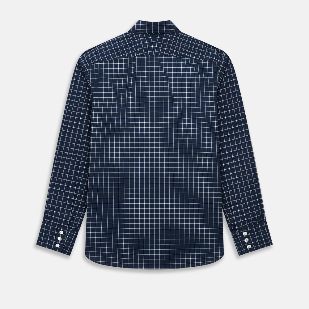The Turnbull & Asser UK Windsor Navy Regular Fit Shirt in Cotton is a classic men's long-sleeve, button-up shirt featuring a navy blue base with a white grid pattern, displayed laid flat on a white background.