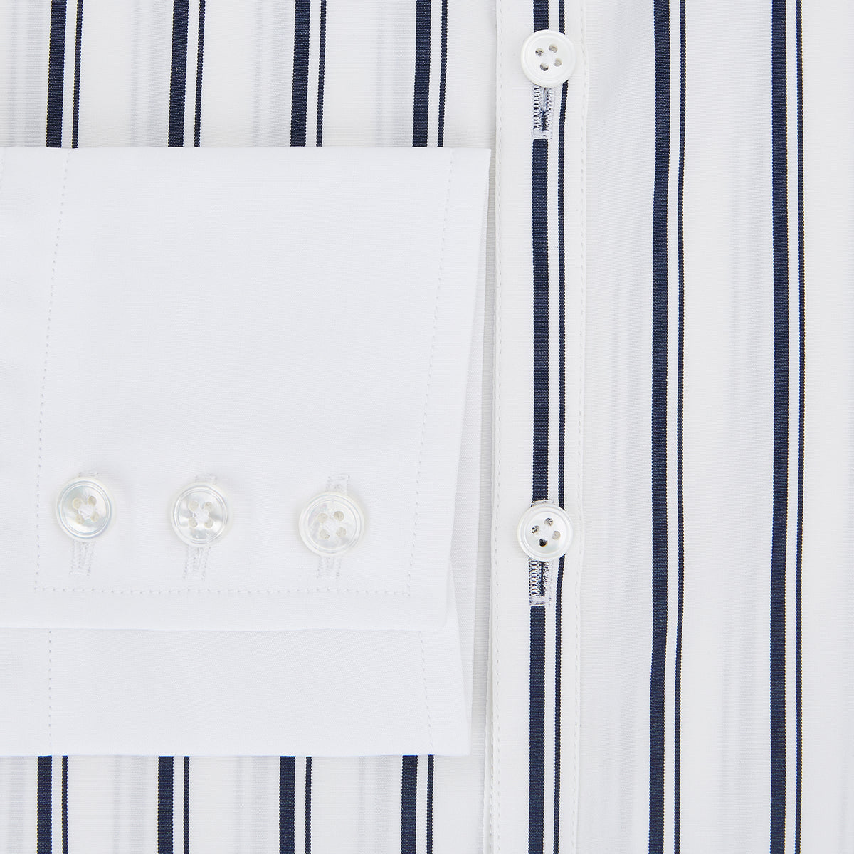 View 4 of product Turnbull & Asser UK Westminster Double Stripe White Closed Collar Regular Fit Shirt in Cotton, a long-sleeve shirt with a white collar and cuffs featuring a vertical black stripe pattern on a white background that evokes British heritage.