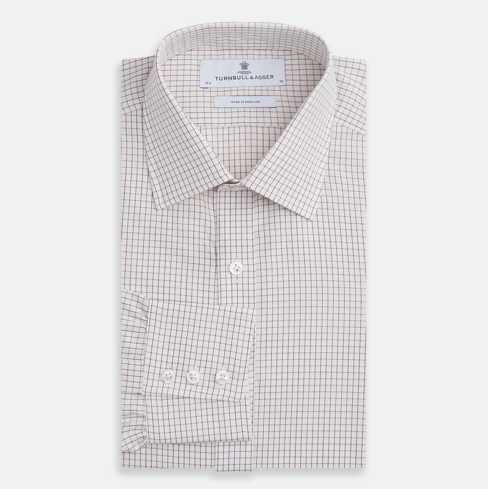 The Turnbull & Asser Purple Graph Check Mayfair Shirt features a classic T&A collar and cuffs, long sleeves, and a subtle purple checkered pattern, shown against a white background.