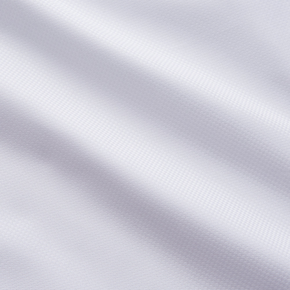 The Turnbull & Asser White Tailored Fit Dress Shirt, featuring a classic collar and button cuffs, is neatly displayed against a white background—perfect as a black tie shirt for formal occasions.
