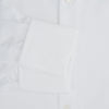 View 4 of product The Turnbull & Asser Tailored Fit White Royal Oxford Cotton Shirt features a Kent collar, double cuffs, and front buttons, shown on a clean white background.