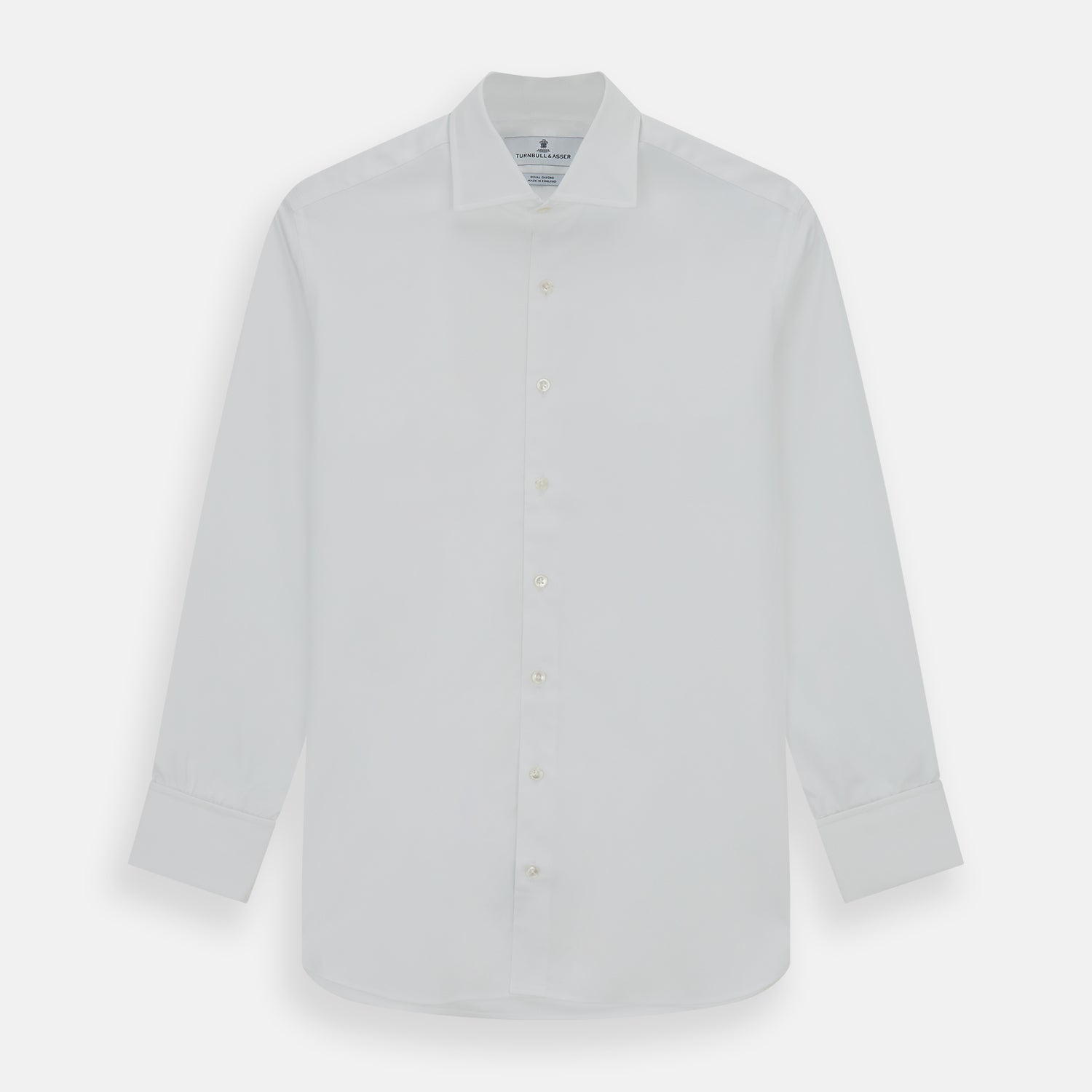 View 1 of product The Turnbull & Asser Tailored Fit White Royal Oxford Cotton Shirt features a Kent collar, double cuffs, and front buttons, shown on a clean white background.