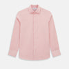 View 1 of product The Turnbull & Asser UK CORAL COTTON MINI CHECKED SHIRT is a light pink long-sleeve button-up shirt with a Kent collar, white buttons, and three-button cuffs, shown on a plain white background.
