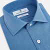 View 2 of product A tailored-fit, long-sleeve Pinstriped Colony Blue Shirt in cotton by Turnbull & Asser UK, featuring a classic collar and white buttons, is displayed on a white background—ideal for formal wear.