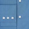 View 4 of product A tailored-fit, long-sleeve Pinstriped Colony Blue Shirt in cotton by Turnbull & Asser UK, featuring a classic collar and white buttons, is displayed on a white background—ideal for formal wear.