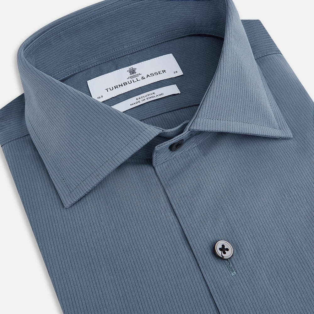 A long-sleeved, button-down Kent collar shirt by Turnbull & Asser UK, featuring a steel gray and navy stripe pattern, displayed on a plain white background.