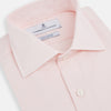 View 2 of product The Turnbull & Asser Tailored Fit Pale Pink Cotton Cashmere Belgravia Shirt features long sleeves and a collar for a formal look, shown flat against a white background.