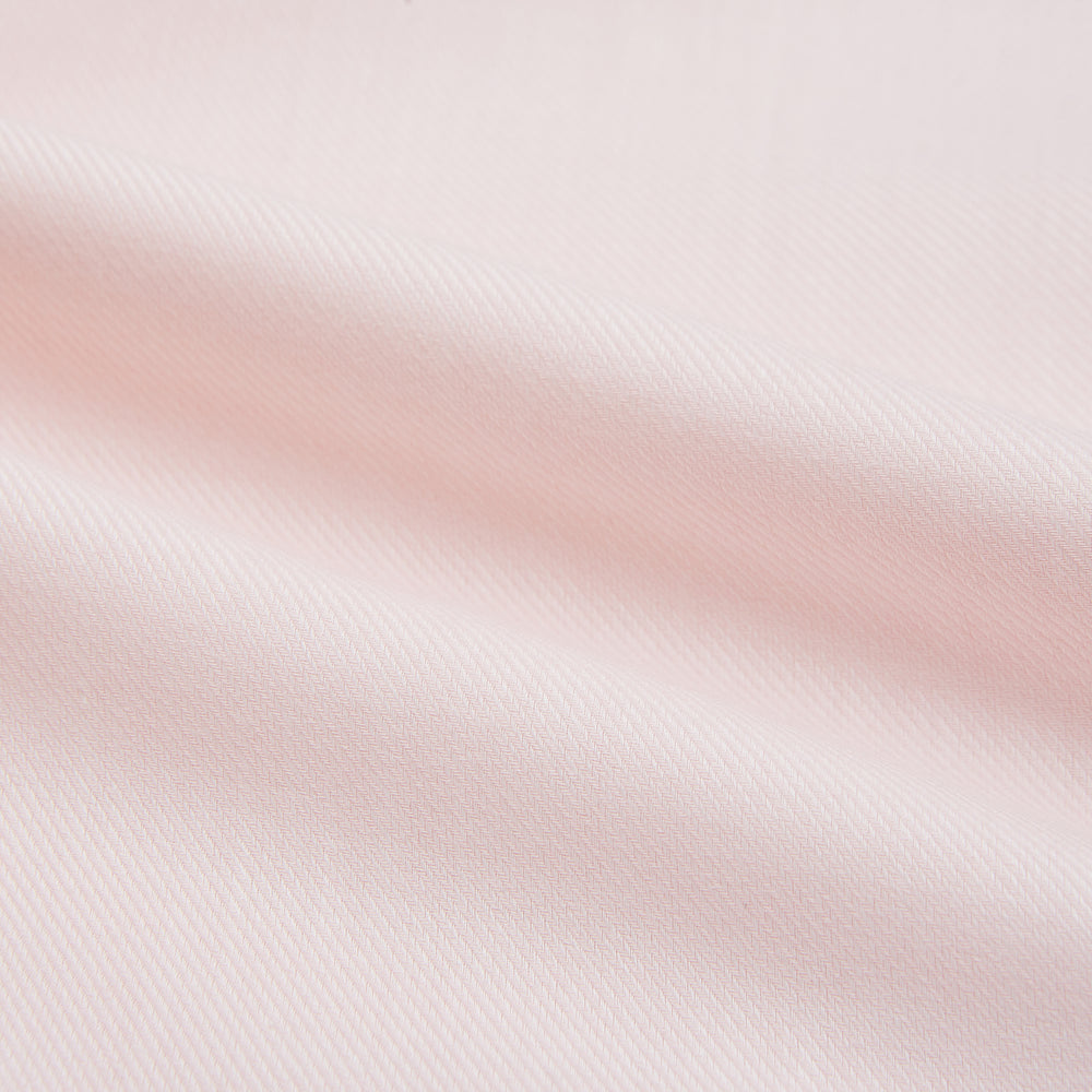 The Turnbull & Asser Tailored Fit Pale Pink Cotton Cashmere Belgravia Shirt features long sleeves and a collar for a formal look, shown flat against a white background.